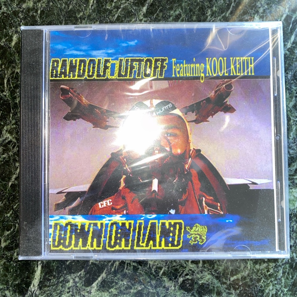 Randolf liftoff Down on land featuring Kool keith